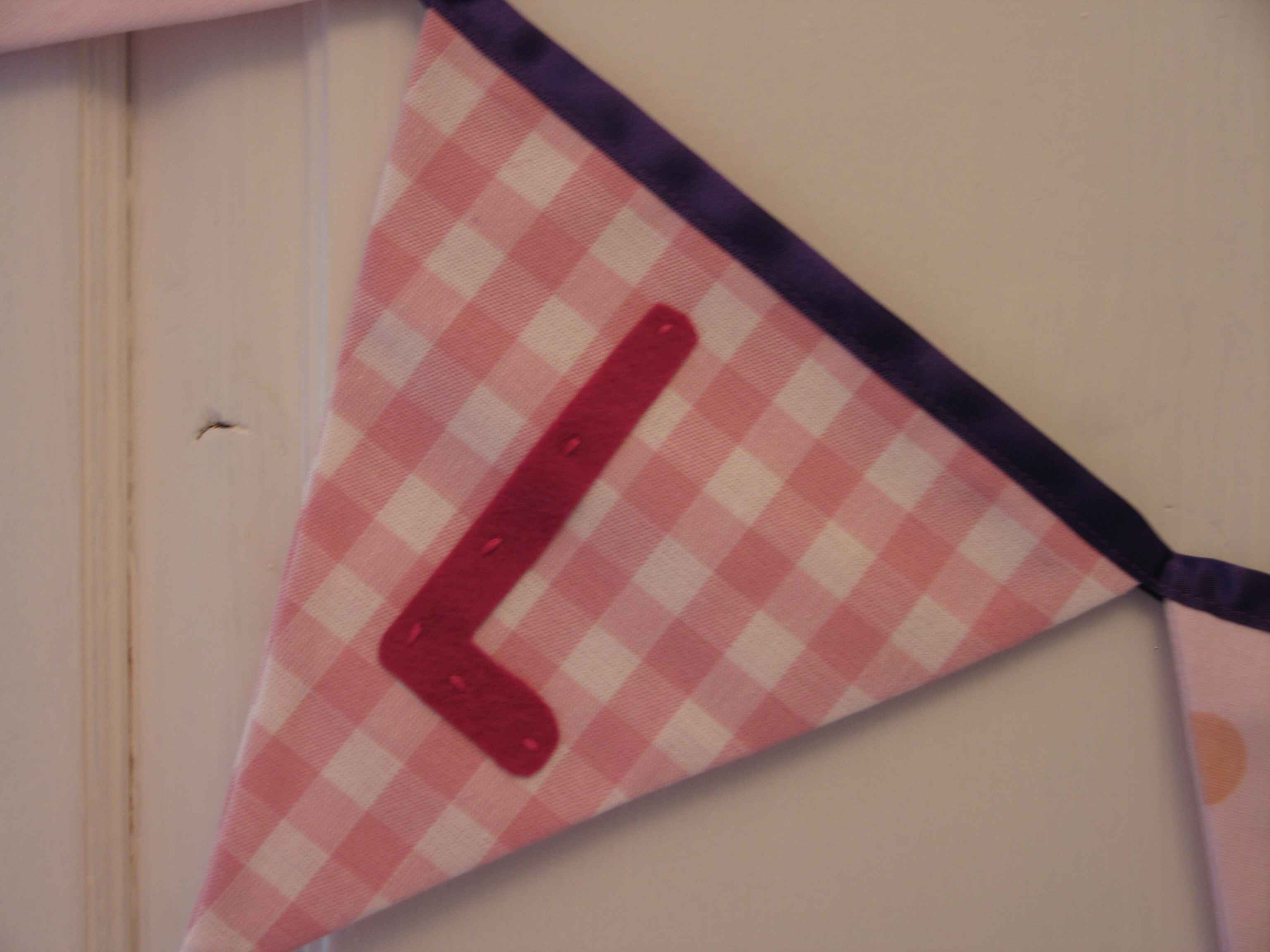 Letter 'L' in pink gingham